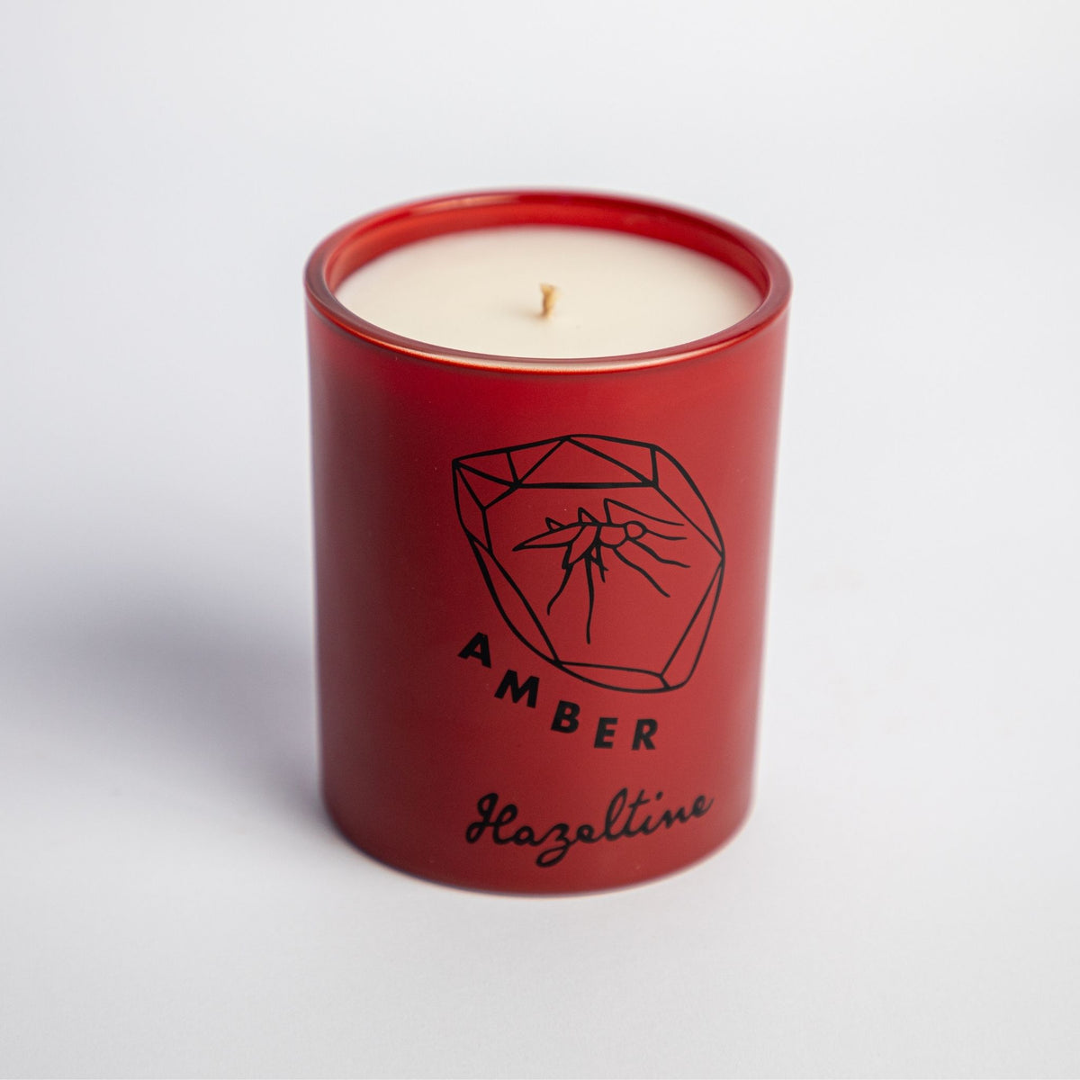 amber scented candle in brown jar