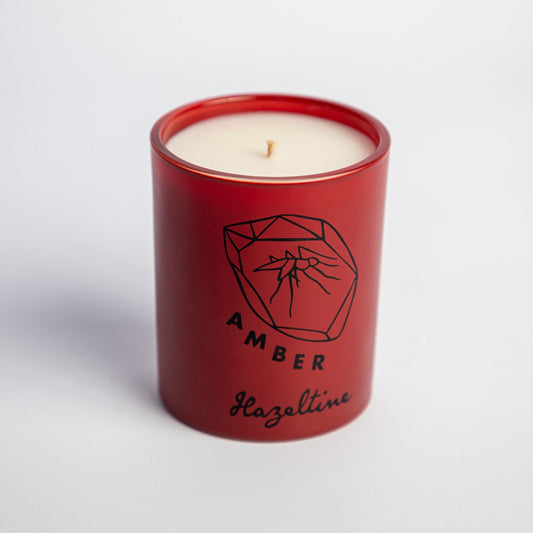 amber scented candle in brown jar