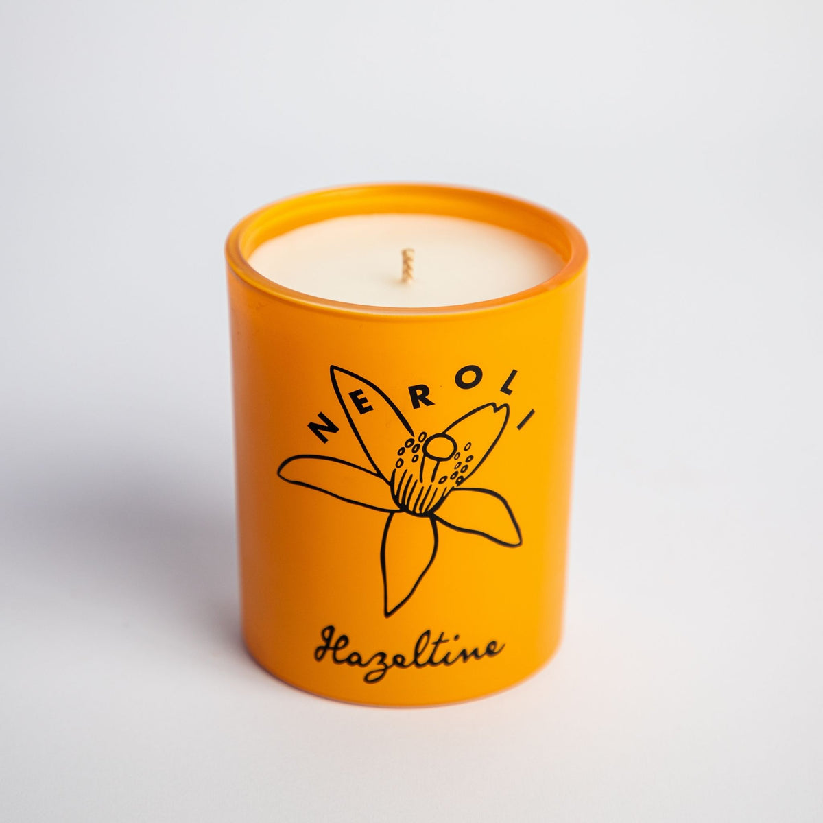 neroli scented candle in yellow jar