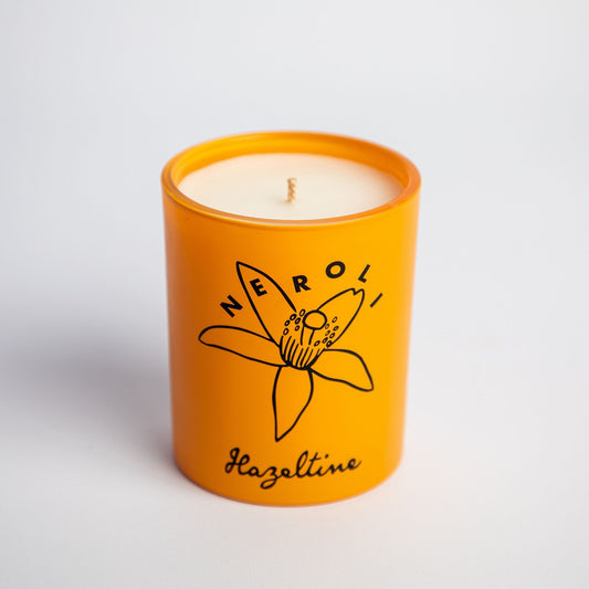 neroli scented candle in yellow jar